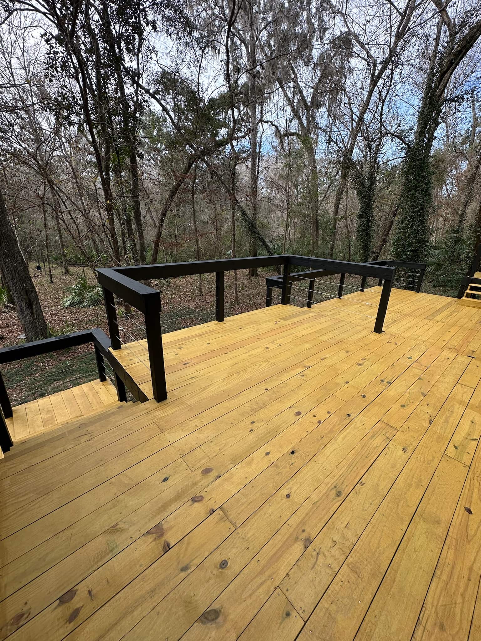 Outdoor deck build and construction project by GMZ Remodeling in Gainesville, Florida