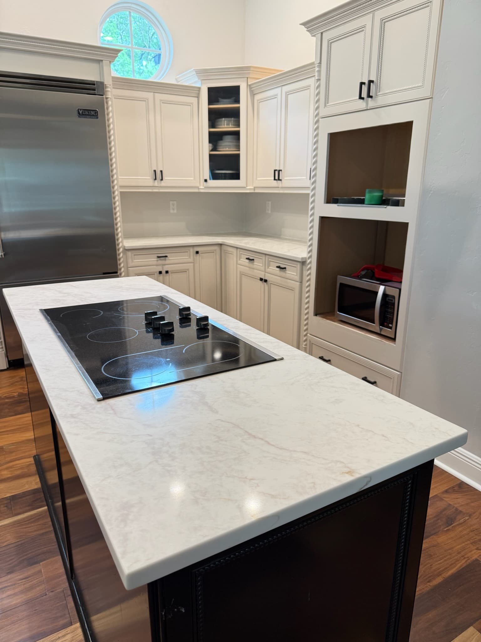 Professional kitchen remodel with custom cabinets and modern appliances completed by GMZ Home Builders in Gainesville, Florida
