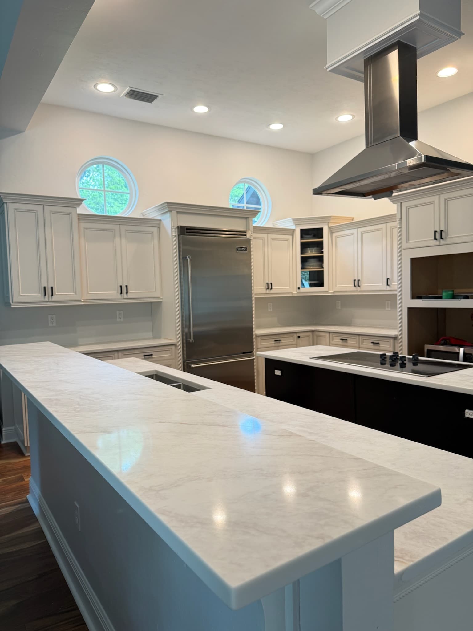 Professional kitchen remodel with custom cabinets and modern appliances completed by GMZ Home Builders in Gainesville, Florida