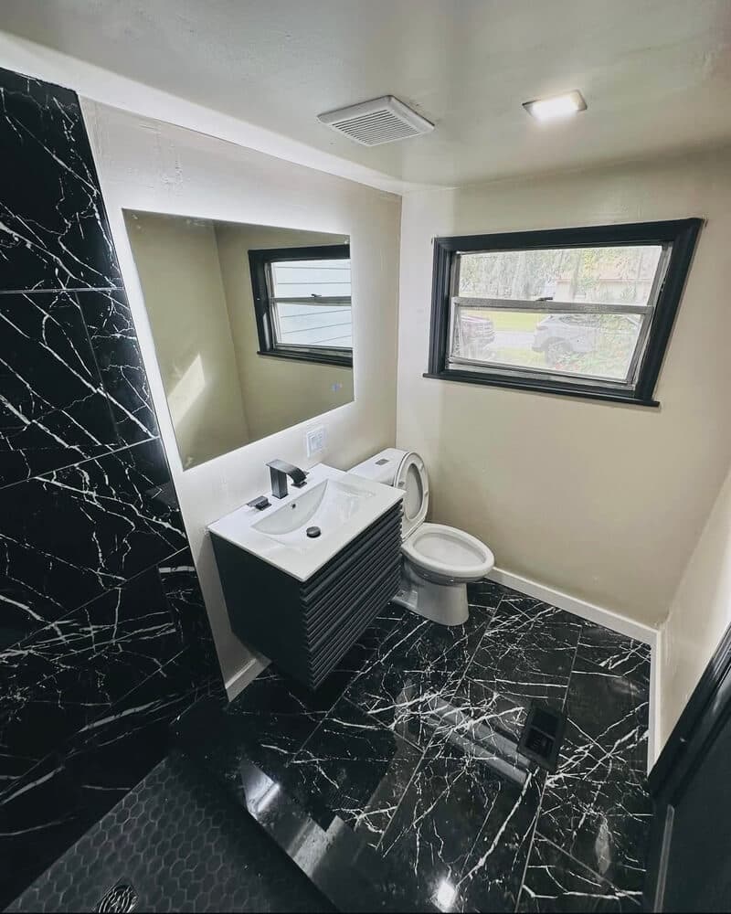 Professional bathroom remodeling project completed by GMZ Remodeling in Gainesville, FL showing modern fixtures and tile work